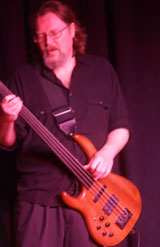 Dave Jordan on fretless electric bass guitar