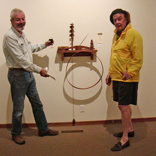 Gualala Salon first place winner Allan Adams (left) and judge Ira Yeager (right) with Adams' winning piece, 'Mendonoma Memorabilia'