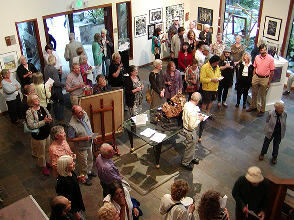 Gualala Salon opening reception: attendees listen as the award winners are announced