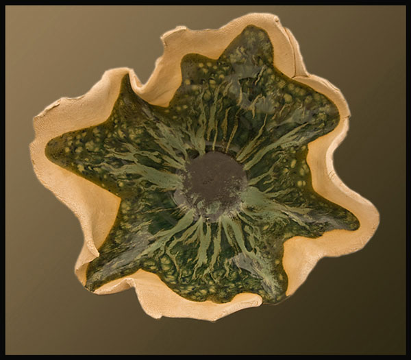 Green folded bowl, by Jan Maria Chiappa