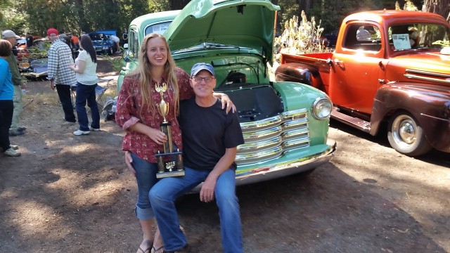 2015 Gualala Arts Auto Show Best of Show winner Hannah O'Brien and her father, Jeffry O'Brien, in front of her trophy winning 1953 Chevrolet 3100 Pickup